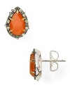 The garden serves as inspiration for this pair of thorn-shaped studs from Elizabeth and James, accented by striking carnelian and garnet stones.