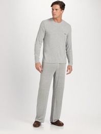 A soft loungewear classic with a silky finish, relaxed fit and preeminent comfort. Crewneck Long sleeves 90% modal/10% elastane; machine wash Imported 