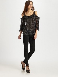 Breezy leopard-print silk hangs off the shoulders in this ruffled topper.Wide strapsOpen shouldersGathered sleevesPullover styleAbout 27 from shoulder to hemSilkDry cleanImported of USA fabric
