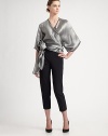 Metallic, silk blend, rendered in a wrap front kimono style with a dramatic, sculptural side tie.Surplice necklineWide three-quarter kimono sleevesWrap front with side tie74% viscose/26% silkDry cleanMade in Italy of imported fabricModel shown is 5'10 (177cm) wearing US size 4. 