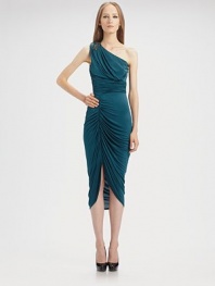 Ruching, beading on the shoulder and an asymmetrical hem with a front slit creates a sultry cocktail party look.One shoulder Draped bodice Side zip closure Gathered waist Ruched skirt About 24 from natural waist 94% acetate/6% spandex Dry clean gently; protect beading Made in USA of imported fabric