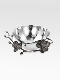 A stunning little bowl inspired in the forms and textures of nature, crafted with an artisan's eye from hammered stainless steel and blackened nickel-plated metal by one of America's premier metalwork artists. From the Black Orchid Collection2½H X 5 diam.Hand washImported