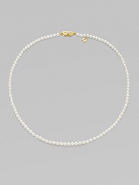 A single strand of luminous pearls with signature clasp closure.4mm white cultured pearls 18K yellow gold Length, about 16 Minuette clasp closure Imported 