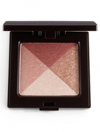 A unique baked formula that applies effortlessly while brightening the eyes, cheeks and body with a hint of natural colour and light. Contains light-reflecting properties that blend together to give the skin a healthy all-over glow. Use colors individually as eye shadows or highlighters to create the look you desire. 0.21 oz. 