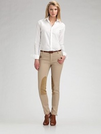 A crisp, slender-fitting style to top any classic outfit. Button front Back darts Cotton/elastene; machine wash Imported