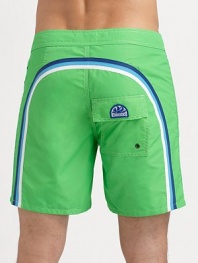 Comfortable, quick dry trunks have a lace-up waist and signature rainbow detail across the back and down the leg. Drawstring waist Grip-tape fly Back flap pocket with grip-tape closure Partial lining Inseam, about 7 Two-ply nylon Machine wash Imported 