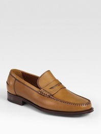 Timeless slip-on classic finished in smooth Italian calfskin leather.Leather upperLeather liningPadded insoleLeather soleMade in Italy
