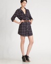 Long heritage plaid in your favorite boyfriend fit to wear as a tunic or dress, with a double-wrap belt to cinch the waist. Foldover collar Button front closures Chest patch pockets Rolled sleeves Belt included About 17 from natural waist Cotton; machine wash Imported 