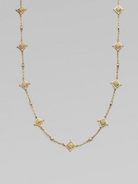 A long glamorous chain bedecked in sparkling stones.Glass Enamel 14k goldplating Chain length, about 41 Imported