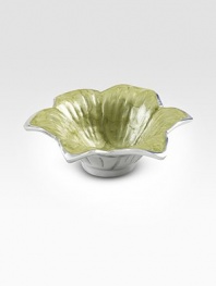The gentle curves of a blossoming lily are handcrafted in sandcasted metal, then colored with an enamel made from crushed, opalescent mother-of-pearl. Food safe Engraved signature 1½H X 4 diam. Hand wash Imported 