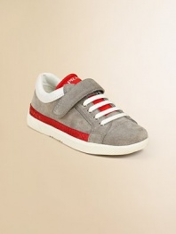 Lace-up sport sneaker with contrast trim and perforated leather.Leather upperGrip-tape closureRubber soleImported