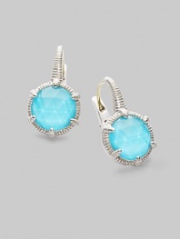 From the Eclipse Collection. A vividly colored, richly faceted turquoise sits in a sterling silver pronged setting with a graceful fluted texture. Turquoise Sterling silver Drop, about ¾ Diameter, about ½ Ear wire Imported