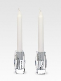 Stunning crystal candle holders are artisan-crafted in France to catch every candle's gentle flicker of light. From the Louxor Collection Set of 2 Fits standard taper candles Candle not included Hand wash 1¾W X 3¼H X 1¾D Made in France 