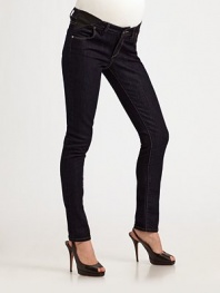 This skinny silhouette in a chic dark denim features elastic insets for ultimate flexibility.THE FITMid rise Inseam, about 31THE DETAILSZip fly Button closure Back pockets 73% cotton/27% elasterell; machine wash Made in USA