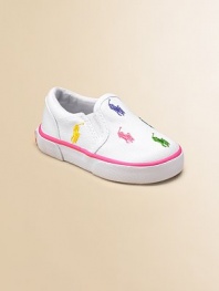 Cute, colorful polo players adorn this slip-on style with a comfy padded insole. Elastic gore detail Cotton upper Polyester lining Imported