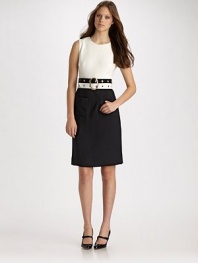 Designed to flatter, this smart two-tone style is finished with a wide, multi-grommeted belt.Round neckline Sleeveless Belted waist Topstitched seams Two patch pockets Back keyhole and button closure Concealed back zipper About 37 from shoulder to hem 53% polyester/43% wool/4% lycra Dry clean Made in USA of imported fabric
