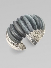 This exceptional cuff design circles the wrist with agate stones and sterling silver.Agate Sterling silver Width, about 1½Diameter, about 2Made in Bali