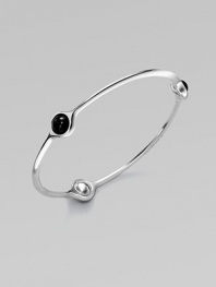 A sleek and modern piece with three smooth black agate stations set in sterling silver. Black agateSterling silverSlip-on styleLength, about 7¾Imported 