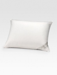 Experience the luxury of a good night's sleep, with this plush, cozy goose down pillow encased in a finespun cotton sateen cover.Decorative piped edgeBaffled construction20 X 26Goose down fillCotton sateen coverMachine washMade in USA
