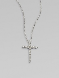 A beautiful cross that sparkles with diamonds in 18k gold on a chain link necklace. Diamonds, .1 tcw18k white goldLength, about 16 to 18 adjustablePendant size, about ½ Lobster clasp closureMade in Italy