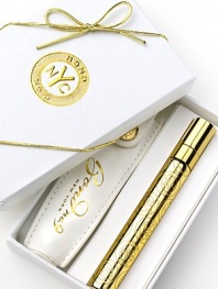 EXCLUSIVELY AT SAKS. The go-everywhere, refillable gold-tone pocket spray, patterned with multiples of the Bond No. 9 token in its own white leatherette pouch. Notes of Violet Leaf, Mandarin Zest, Freesia, Red poppy buds, Orris (iris root), teakwood, Musk and Amber. 0.25 oz. 