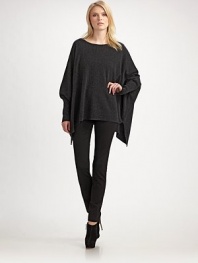 Body-hugging stretch knit for a slim silhouette.Elastic waistband Back seam Inseam, about 32 65% viscose/30% nylon/5% spandex Professional dry clean only Imported