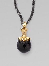 A goldplated sterling silver lion claw, complete wit pavé black cubic zirconia, looms over a jet crystal, strung on a long elegant chain.Jet crystal Cubic zirconia Goldplated sterling silver Black rhodium plated sterling silver Chain length, about 30 Pendant width, about 1½ Lobster clasp Imported