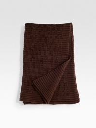 Richly textured in luxurious cashmere, inviting in any setting. 12-ply yarn 56 X 72 Cashmere; dry clean Imported