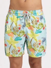 A colorful tropical print adorns these quick-dry trunks, complete with drawstring waist and back eyelets to avoid a ballooning effect.Drawstring elastic waistBack flap pocket with grip-tape closureMesh liningPolyamideMachine washImported