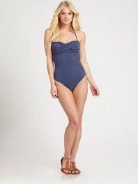 Polka dots add retro appeal to this adorable swim style with flattering ruched sides.Bandeau topFlattering gathered detailsUnderwire cupsFully lined90% polyester/10% spandexHand washMade in USA of Italian fabric