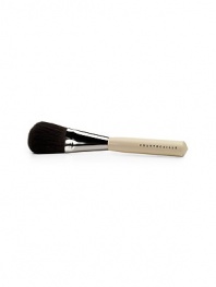 An oversized brush to apply face powder. Made of luxuriously soft black squirrel hair. Also available with a shortened handle. 