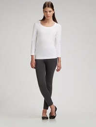 A seasonless essential in smooth, soft, feather-light stretch jersey. Scooped neckline Three-quarter sleeves Cotton/spandex; hand wash Imported