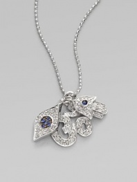 A whimsical trio of hamsa, evil eye, and om charms, rendered in sparkling diamonds and rich blue sapphires, hang from a delicate white gold chain. Diamonds, 0.21 tcw Sapphires 14K white gold Chain length, about 16 Claw clasp Made in USA 