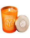 EXCLUSIVELY AT SAKS FIFTH AVENUE. From a uniquely New York collection of scents, this unisex scented candle celebrates the lively charm of Little Italy.  · Blend of mandarin, sweet tangerine, Clementine and musk  · Made of the finest wax and wicks  · In sturdy, tinted glass container  · Gilt metal cap keeps scent from fading 