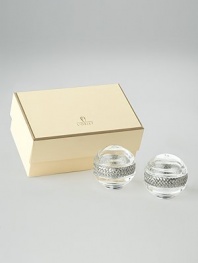 Distinctive salt and pepper crystal spheres are embraced by a braided band. Also available with platinum-plated band. Clear, lead-free crystal Gold-plated band Gift boxed Imported
