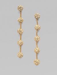 Dazzling pavé-set spheres are elegantly linked by graceful chains in this lovely dangle design.Crystal14k goldplatedDrop, about 3Post backImported