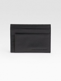 EXCLUSIVELY OURS. A standard-bearer of classic style, crafted in our own pebbled calfskin leather. A slim-line design in our own pebbled calfskin leather that slips easily into any pocket. Two card slots 4 X 3 Imported 