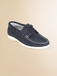 He'll look nautical and nice in classic boat shoes with stitching and lace detail. Lace-up closureLeather upper90% cotton/10% leather liningRubber soleImported