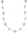Decorate yourself with the ultimate in elegance. This light illusion necklace by Carolee features glass pearls and crystal fireballs suspended from a delicate chain crafted in mixed metal. Approximate length: 16 inches.