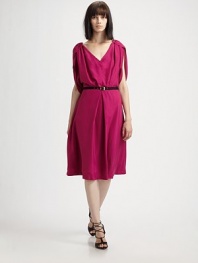 This full-skirted, feminine silk design boasts puffed, capelet-like cap sleeves and a contrasting belt.V necklineSlightly puffed three-quarter cap sleevesIncluded cotton beltInverted front pleatBack keyhole button closureConcealed back zipSilk liningAbout 25 from natural waistSilkDry cleanMade in Italy of imported fabricModel shown is 5'9 (175cm) wearing US size 4. 