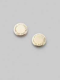 Polished disc-shaped studs, carved with the iconic designer's logo. Brass Diameter, about ¼ Post back Imported