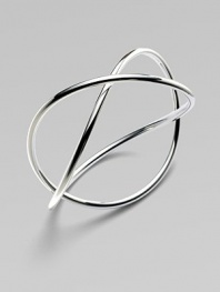 A simply chic, sterling silver style with an unique crossed design. Sterling silverSlip-on styleDiameter, about 2½Imported 