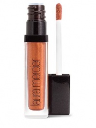 Instantly plumps, hydrates and moisturized for healthier, sexy lips. A refreshing, cooling effect builds up over 20 minutes to plump lips, lasting up to two hours. Adds a slight tint to the lips for natural looking lips. Apply liberally to the lips using the applicator or the Laura Mercier Lip Colour Brush. 0.18 oz. 