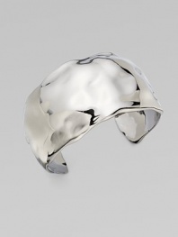 This bold, undulating cuff has a stunning liquid look and a polished gunmetal cast.Ruthenium platedDiameter, about 2¼ (adjustable)Width, about 1½Imported