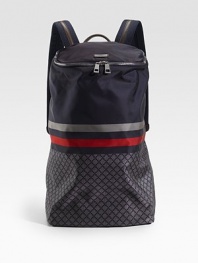 A cylindrical backpack designed in signature diamante nylon with blue/red/blue web trim and leather trim. Top zip closure Adjustable shoulder straps Interior zip, cell phone, PDA pockets Nylon lining 10.2W X 8.7H X 18.5D Made in Italy 
