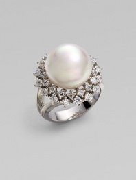 Two thorny rows of rhinestones form a sparkling crown around this regal pearl. 14mm round man-made pearl Cubic zirconia Sterling silver Diameter, about 1 Made in Spain 