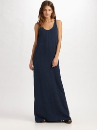 Simple yet elegant, this breezy maxi silhouette is finished with a dropped box pleat at the back for a unique, feminine touch.Scoopneck Wide straps Racerback Back box pleat About 45 from natural waist Tencel Dry clean Imported