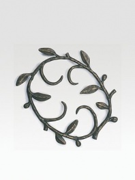 Inspired by the lush growth of an enchanted fairytale forest, this curling vine design is sand cast and sculpted into a graceful trivet.From the Vine Collection Oxidized bronze 7½W x 7½L Nickelplate Hand wash Imported