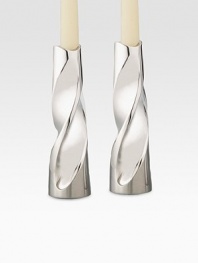 The sleek yet simple design of these twisted-metal alloy candle sticks add impact to every room or occasion. From the Swirl Collection Set of 2 Fits standard taper candles Metal alloy 7½H X 2 diam. Imported 