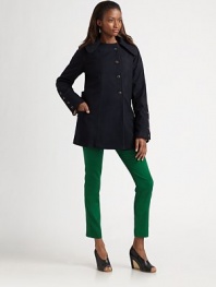 Rich wool felt crafted in a classic A-line silhouette with single-breasted styling.Point collar Asymmetrical button front Princess seams Selt pockets Fully lined About 30½ from shoulder to hem Wool; dry clean Made in USA of Italian fabric